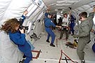 [Photograph of Tech grad Crystal Schroeder working on the NASA 